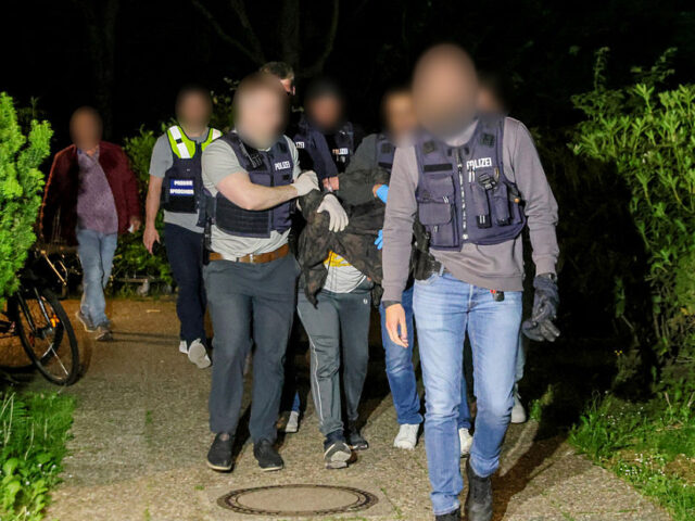 Sources: Bielefeld attack could be Islamist motivated dpatop - 19 May 2025, Heiligenhaus: Police officers take away the suspect of the attack in