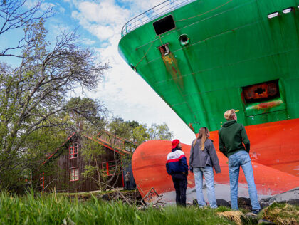 Pictures: Norwegian Man Astonished To Wake Up To Find Cargo Ship in His Garden