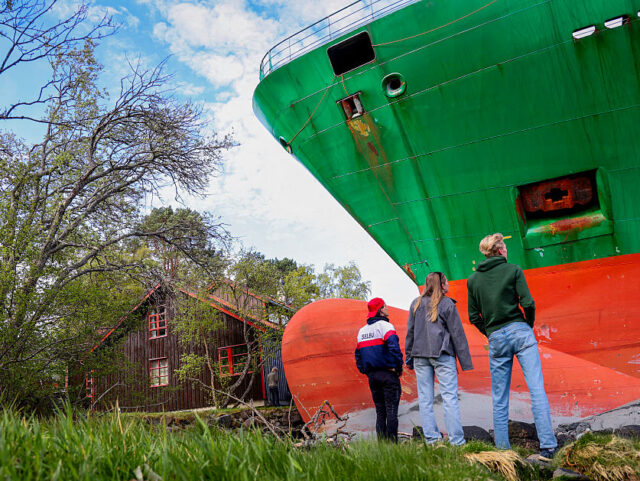 Pictures: Norwegian Man Astonished To Wake Up To Find Cargo Ship in His Garden