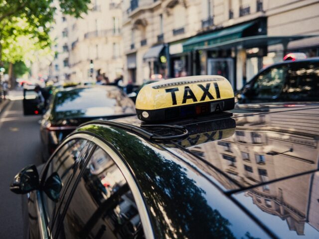 A taxicab vehicle at a a taxicab rally on Boulevard Raspail to demonstrate against propose
