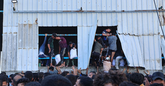 U.N. Fail: Thousands of Palestinians Storm Aid Warehouse in Gaza, Killing at Least 4