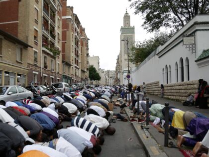 Muslims offer Eid al-Fitr prayers outside the Grande Mosquee de Paris (Great Mosque of Par