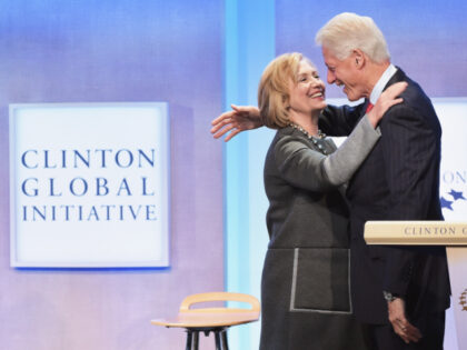 NEW YORK, NY - SEPTEMBER 22: Former US Secretary of State Hillary Clinton and husband, For