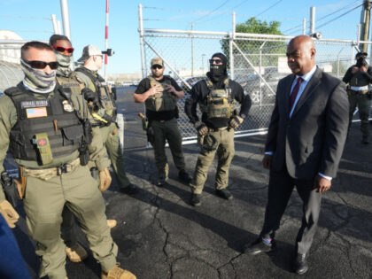 Mayor Ras Baraka of Newark confronts ICE agents at a demonstration outside an immigrant de