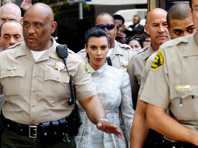 Reality television star Kim Kardashian leaves Los Angeles Superior Court on April 12, 2013