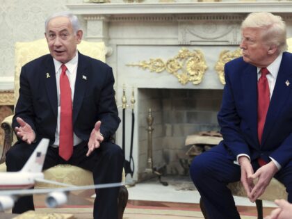 President Donald Trump, right, listens as Israel's Prime Minister Benjamin Netanyahu