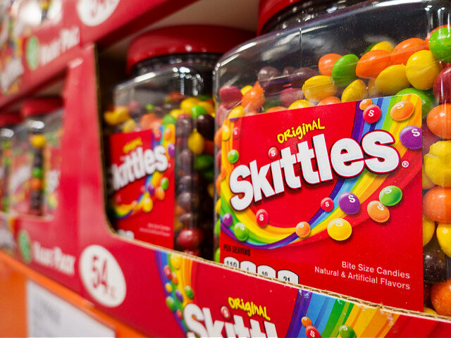 Packages-Skittles-candy-Apr2025-getty SAN DIEGO, CALIFORNIA - APRIL 27: Packages of Skittles candy are displayed at a Costco Who