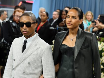 NEW YORK, NEW YORK - MAY 05: (L-R) Pharrell Williams, Met Gala Co-Chair, and Helen Lasicha