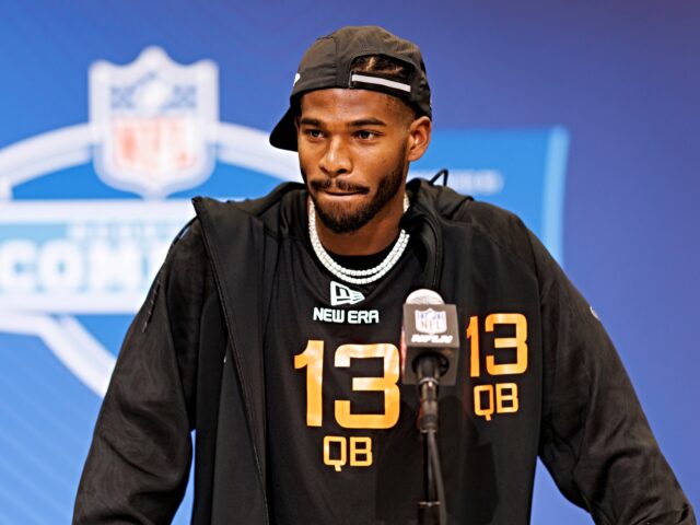 Shedeur Sanders INDIANAPOLIS, INDIANA - FEBRUARY 28: Shedeur Sanders #QB13 of Colorado speaks at the podiu