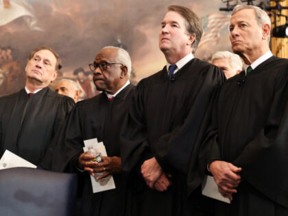 From L-R) US Associate Supreme Court Justices Samuel Alito, Jr., Clarence Thomas and Brett