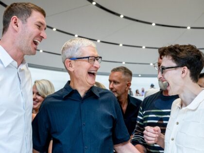 Tim Cook having a laugh at iPhone buyers