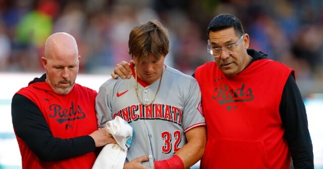 VIDEO: Reds' Rookie Suffers Gruesome Injury After Crashing Into Outfield Wall