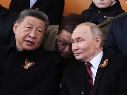 In this pool photograph distributed by the Russian state agency Sputnik, Russia's Presiden