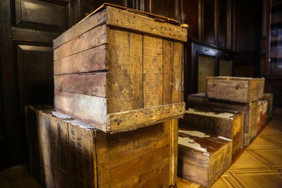 Wooden boxes labeled as Crillon champagne, where the documents were stored. Credit: Argentina Supreme Court.