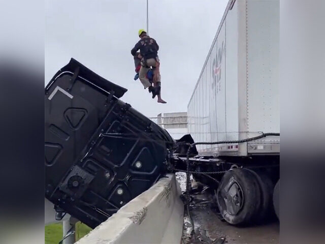 WATCH: Firefighters Save Driver from Truck Cab Dangling on Kentucky Overpass