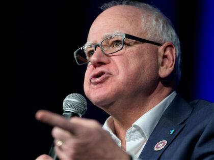 FILE - Minnesota Gov. Tim Walz speaks at a town hall event at Roosevelt High School, Frida
