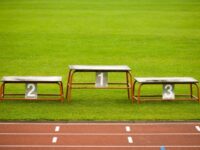 ‘Real Champ!’: Defiant Female Track Star Poses on First-Place Podium After Finishing Se