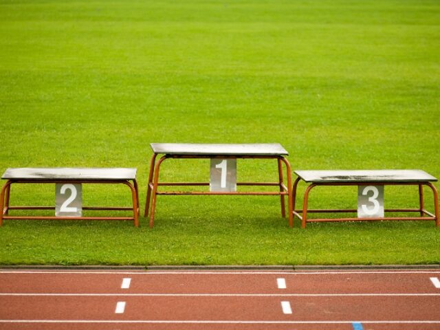 ‘Real Champ!’: Defiant Female Track Star Poses on First-Place Podium After Finishing Se