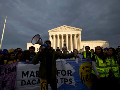Demonstrators arrive in front of the US Supreme Court during the "Home Is Here" March for