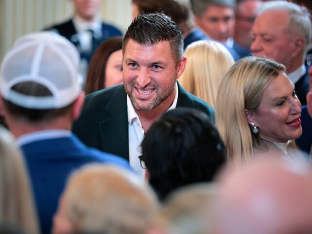 WASHINGTON, DC - MAY 21: Former football quarterback Tim Tebow joins guests during a celeb