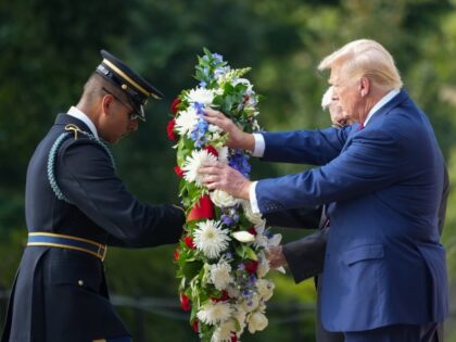 Donald Trump visits Arlington Cemetery to pay tribute to the 13 servicemembers killed duri