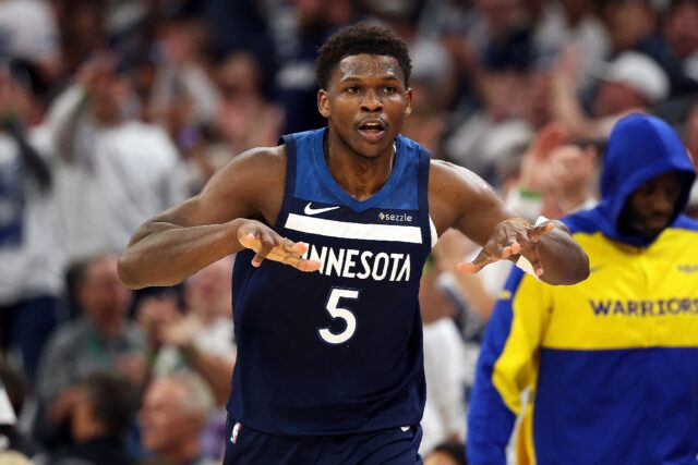 Anthony Edwards celebrates a three-pointer in Minnesota's series-leveling defeat of Golden