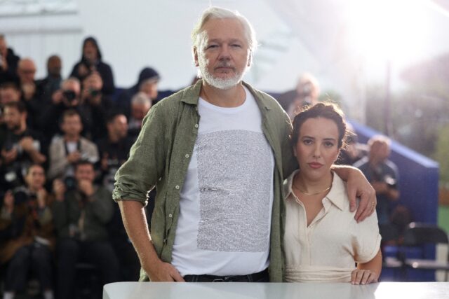Assange with his wife Stella promoting the film "The Six Billion Dollar Man" at the Cannes