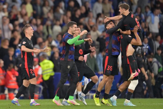 Barcelona players celebrate after winning the La Liga title for the 28th time