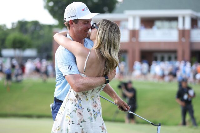 Ben Griffin of the United States celebrates with fiancée Dana Myeroff after winning the C