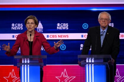 Bernie Sanders and Elizabeth Warren, along with fellow US senator Ron Wyden (not pictured)