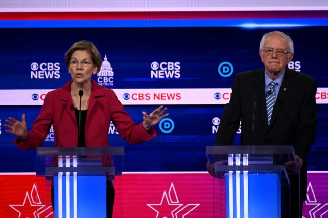 Bernie Sanders and Elizabeth Warren, along with fellow US senator Ron Wyden (not pictured)