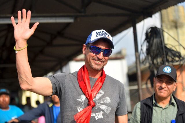 British mountaineer Kenton Cool (L) first climbed Everest in 2004 and has since had an exp