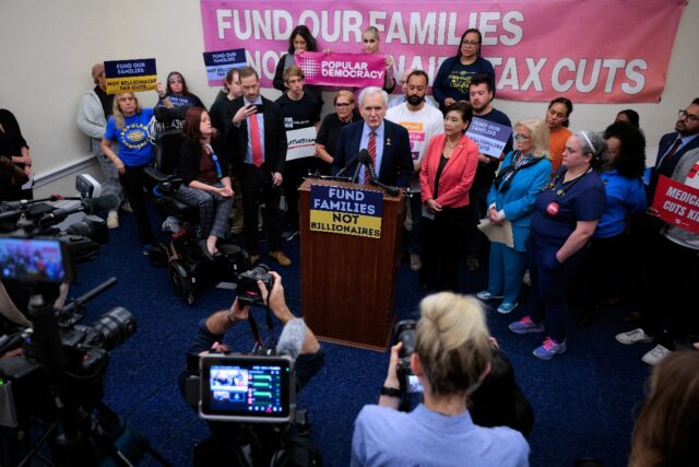 Congressman Lloyd Doggett and fellow US Democrats address a rally and press conference to