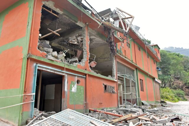 The debris of a mosque stand after after Indian strikes in Muzaffarabad, the capital of Pa