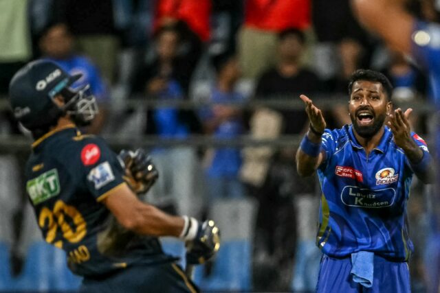 Hardik Pandya (R) missed a shy at the stumps as Arshad Khan completed the winning run