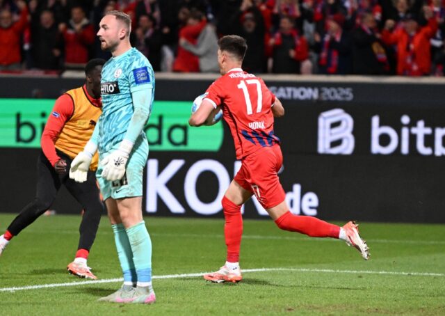 Heidenheim midfielder Mathias Honsak celebrates scoring the equaliser against Elversberg