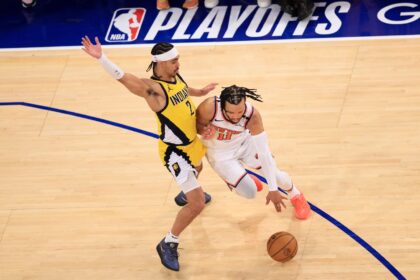 Jalen Brunson (right) drives past Andrew Nembhard in the New York Knicks win over the Indi