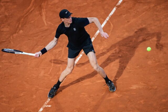 Jannik Sinner hits a forehand during his winning return to tennis action at the Italian Op