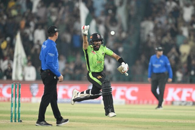 Lahore Qalanders' Sikandar Raza celebrates after playing the winning shot