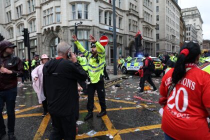 Liverpool's Premier League title celebrations were marred when a car rammed into a crowd o