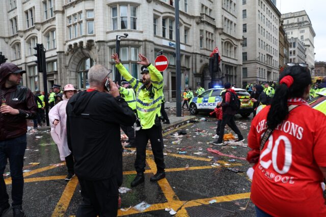 Liverpool's Premier League title celebrations were marred when a car rammed into a crowd o