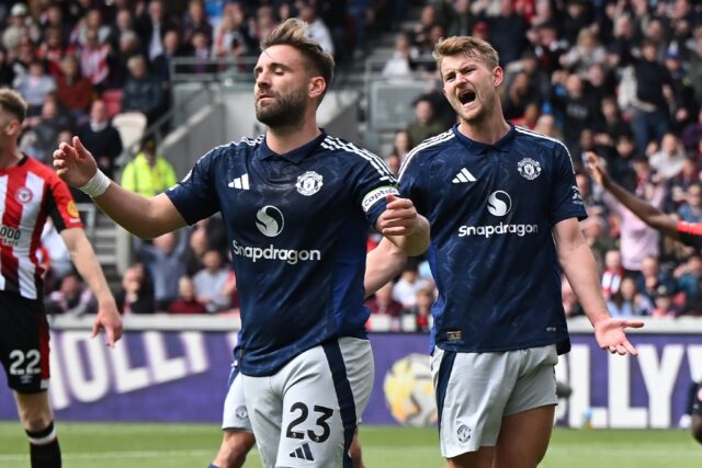 Manchester United's Luke Shaw (L) reacts after scoring an own goal against Brentford