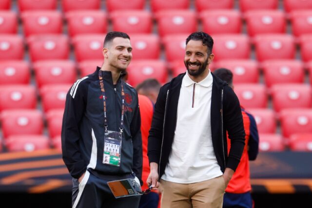 Manchester United's Portuguese head coach Ruben Amorim inspects the pitch ahead of the Eur