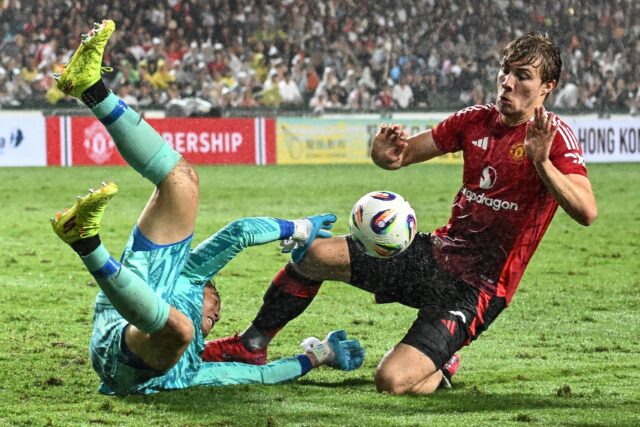 Manchester United's Rasmus Hojlund (right) in action against Hong Kon