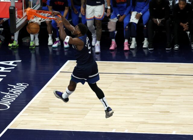 Minnesota's Anthony Edwards slam dunks the ball in an NBA playoff rout of the Oklahoma Cit