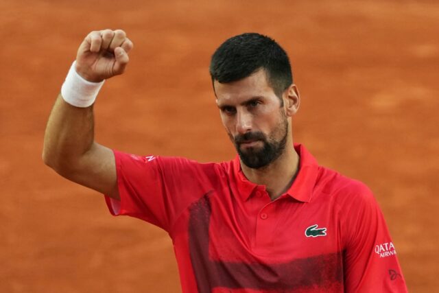 Moving on: Novak Djokovic is through to the French Open third round for a record 20th time