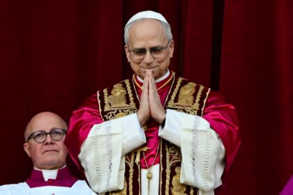 Newly elected Pope Leo XIV addresses the crowd from the balcony of the St Peter's Basilica