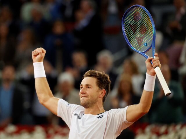 Norway's Casper Ruud celebrates winning against Britain's Jack Draper in the Madrid Open f