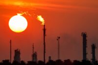 Oil prices slide after OPEC+ output hike