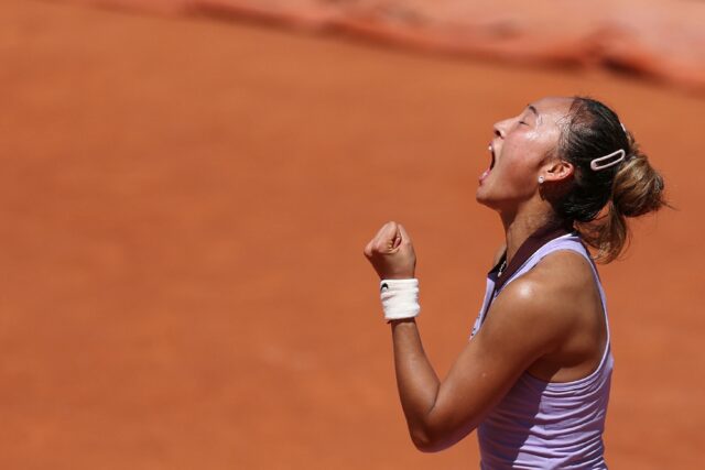 Olympic champion Zheng Qinwen celebrates booking her ticket to the last 16 at Roland Garro